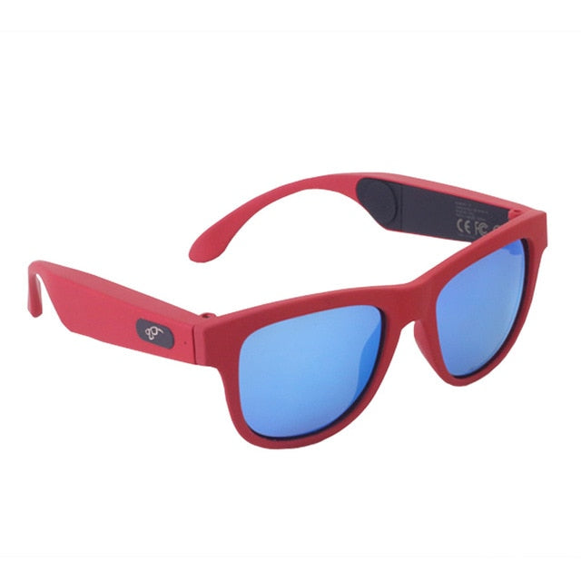 Red smart sunglasses with black tints on the lenses and wireless technology for calls